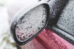 Icy car mirror | Sturgis hail repair